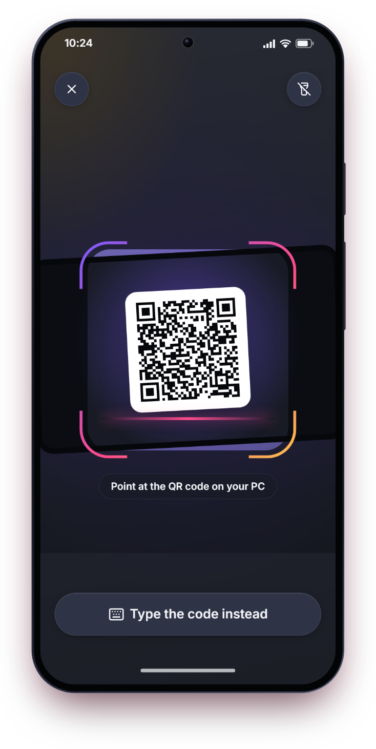 Pairing: the phone's camera view lined up on the QR code shown on the PC, with Type the code instead underneath